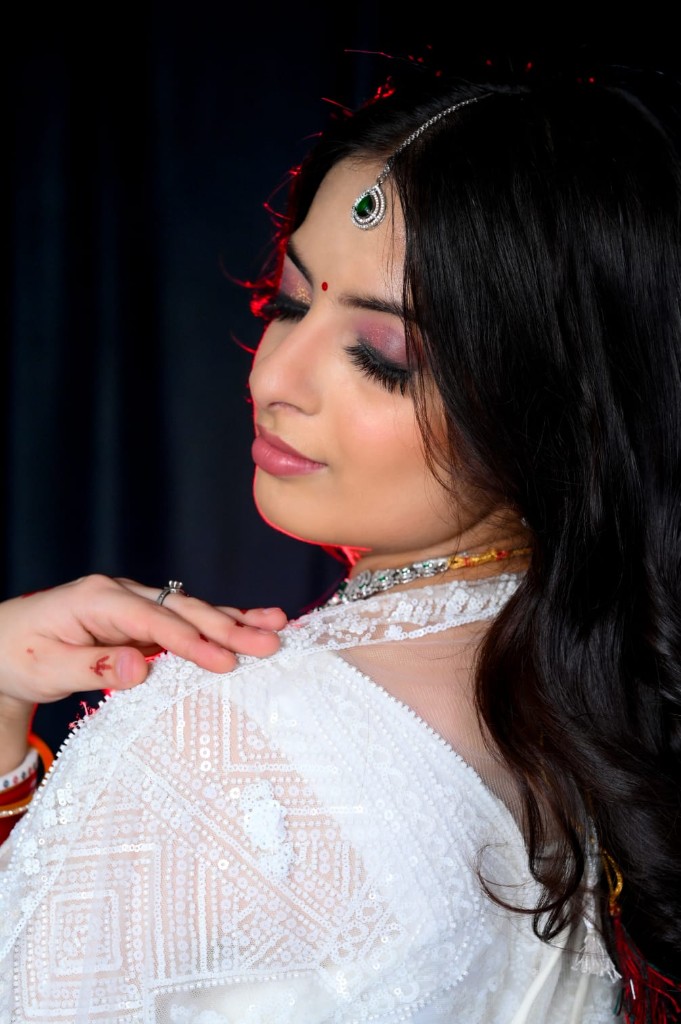 Pankhuri in profile, maang tikka catching the light